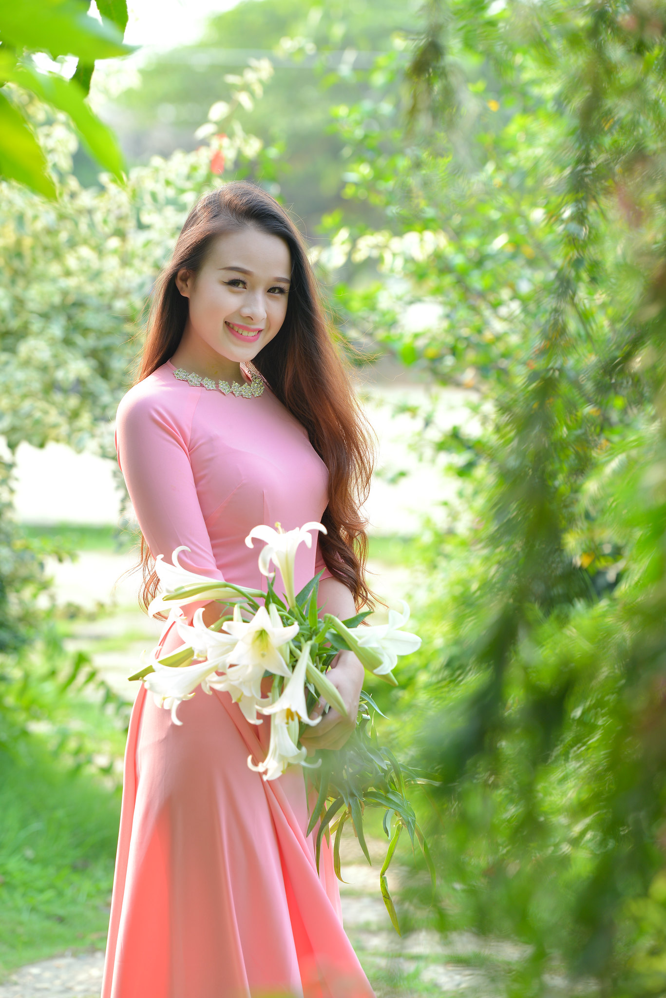Áo dài hồng ảnh nền hoa thanh nhã [DGRUDX]