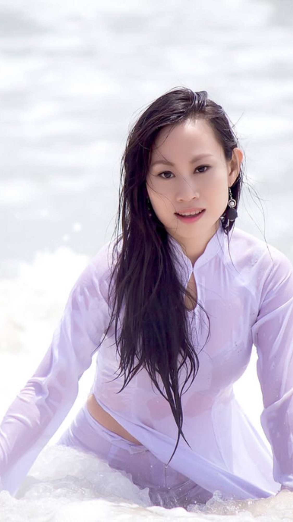 Loạt ảnh áo dài trắng yêu kiều ướt [UQXWSW]