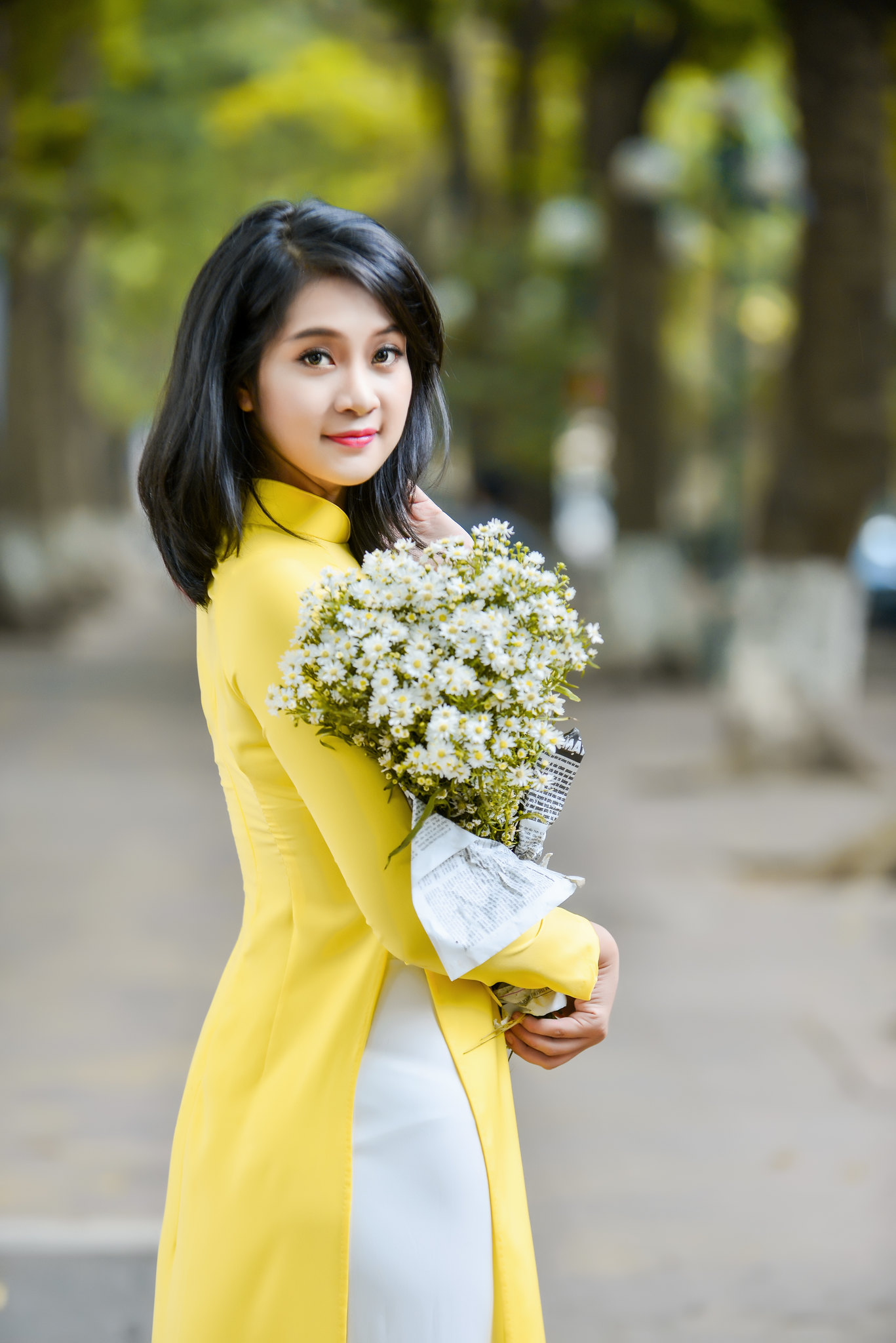 Áo dài vàng bộ ảnh hoa thanh thoát [MAFXEI]