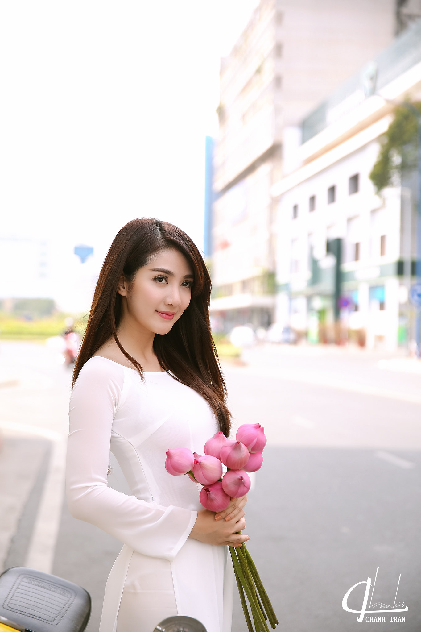 Áo dài trắng thanh thoát [BMQIZX]