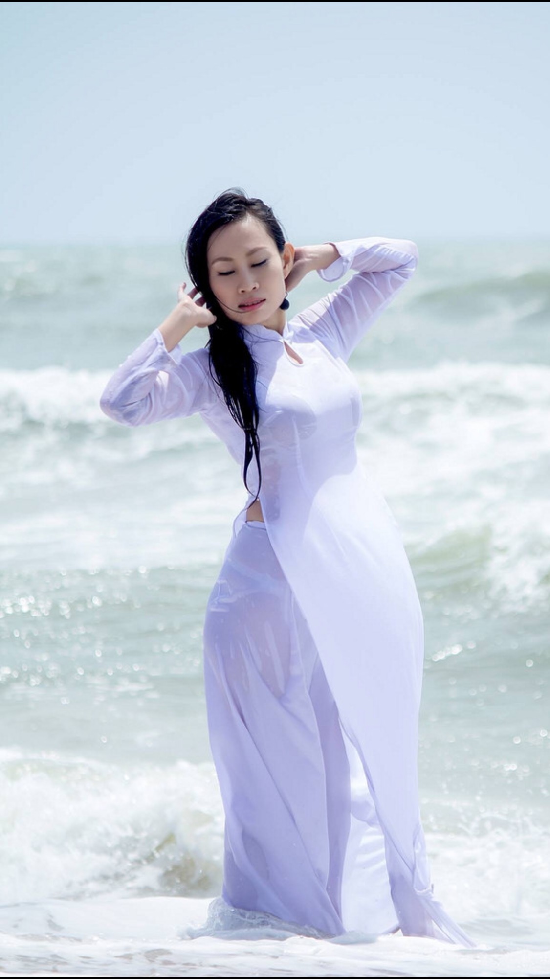 Thanh thoát áo dài trắng ướt [50ESIJ]