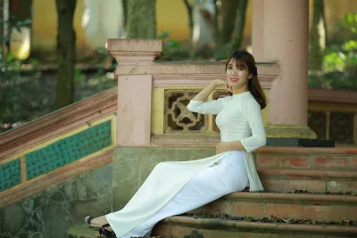 Áo dài trắng góc ngang e ấp [MJDANI]