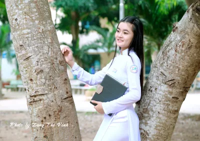 Áo dài trắng cặp táp hài hòa [DSDD4G]