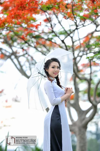 Cách tân áo dài trắng vẻ đẹp Việt Nam hoa phượng [Y0QRQC]