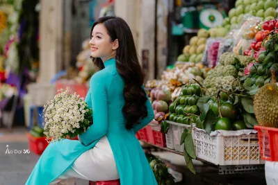 Vẻ đẹp áo dài áo dài xanh nền nã hoa [BDEAEF]