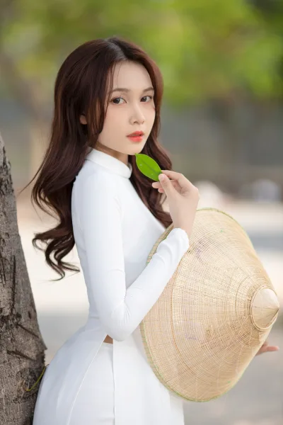 Hình ảnh áo dài trắng dịu dàng nón lá [PWPEEX]