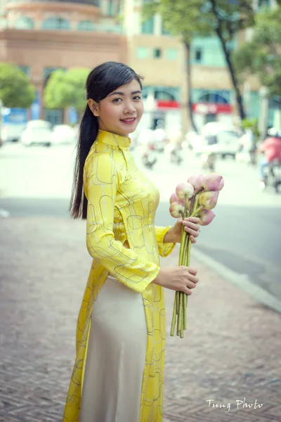 Áo dài vàng hot girl duyên dáng [DYGLNX]