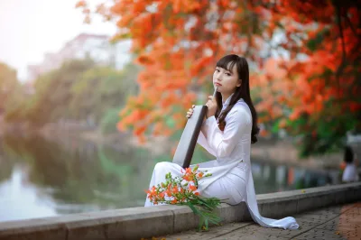 Đằm thắm áo dài trắng hoa phượng [1IUWFW]