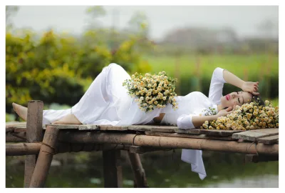Áo dài trắng loạt ảnh nằm ấn tượng [ARAE8A]