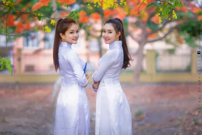 Trang nhã áo dài trắng hoa phượng [56JOIP]