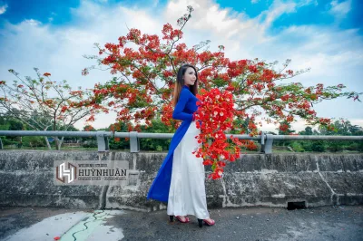 Áo dài xanh hoa phượng truyền thống [JM7O3M]