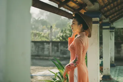 Áo dài cam thanh thoát cổ kính [XH9CDW]