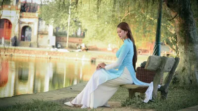 Áo dài xanh thiếu nữ ấn tượng [GNUEH5]