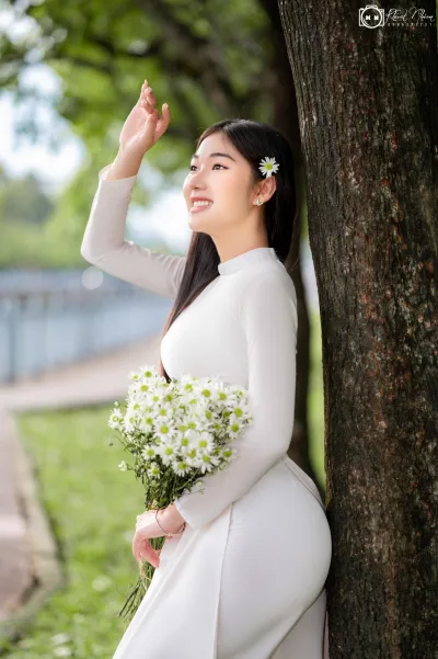 Áo dài trắng hoa thanh lịch [VNI38O]