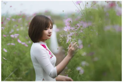 Áo dài trắng cách tân nền nã [5OU3GC]