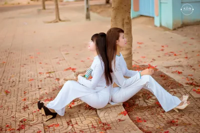Áo dài trắng hài hòa chị chị em em [6A8EIC]