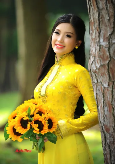 Áo dài vàng đằm thắm hoa [NVPF79]